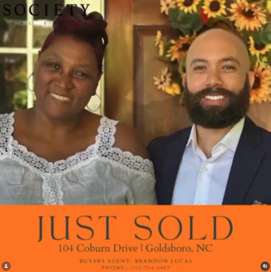 Brandon Lucas with a happy buyer in Goldsboro, NC